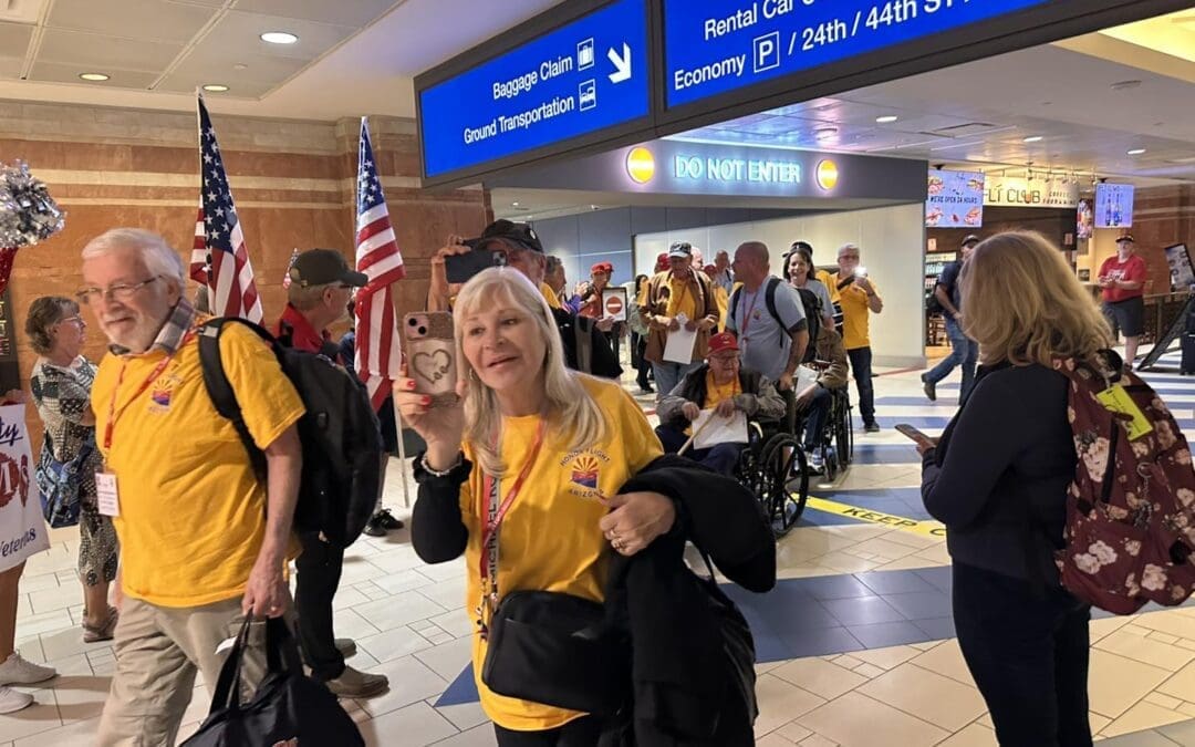 A Vietnam Veteran salutes during a homecoming welcome at Sky Harbor Airport.